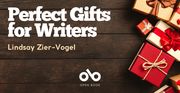 Perfect Gifts for Writers by Lindsay Zier-Vogel banner. Background image of dark hardwood floor running horizontally across banner, with expertly wrapped gifts grouped together at right hand side. Text overlaid to top-left of image and Open Book logo centered at bottom.