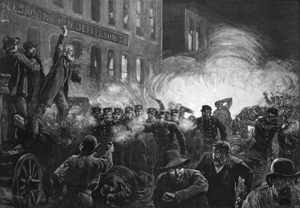 An 1886 engraving published in Harper's Weekly; it depicts police shooting at demonstrators in Haymarket Square in Chicago, with one demonstrator returning fire. To the left, radical Methodist minister Samuel Fielden is depicted giving a speech from a raised platform. A bomb explodes in the background.