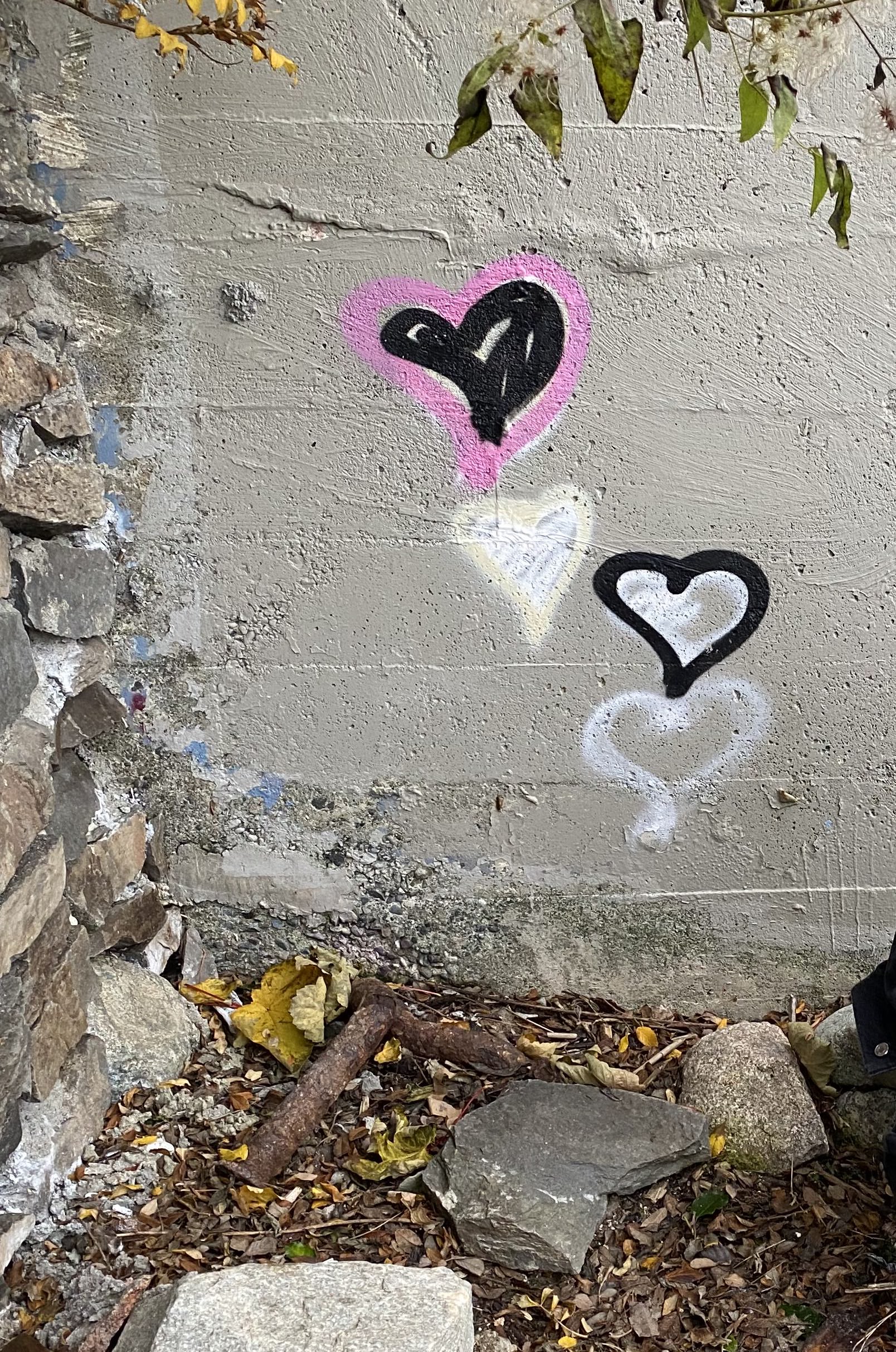 Four hearts on a wall by the steps at Point Grey Road, Vancouver