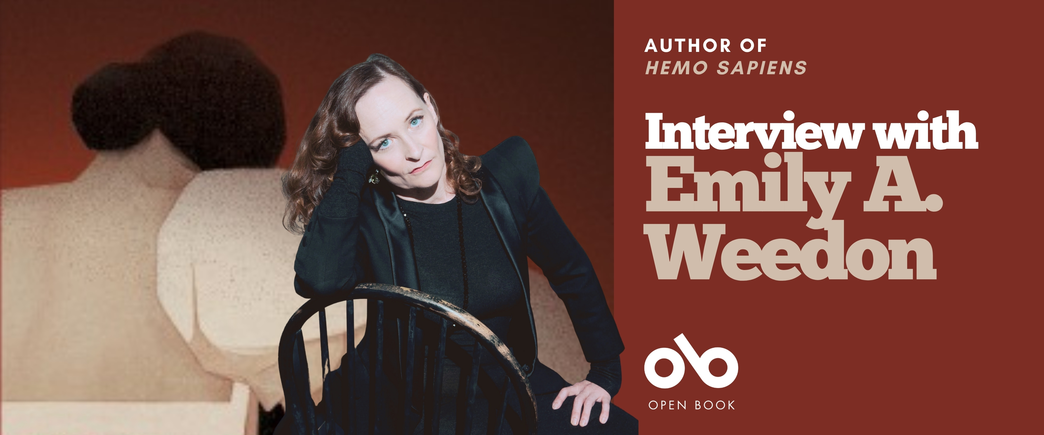 Banner featuring author Emily A. Weedon seated on a black chair, leaning slightly forward with her hand resting on the chair’s back. She has light skin, wavy brown hair, and wears a dark outfit. Behind her is an abstract painting of two figures with their backs turned. The right side of the banner has a dark red background with white text that reads: “Author of Hemo Sapiens — Interview with Emily Weedon.” The Open Book logo appears at the bottom. Banner featuring author Emily A. Weedon seated on a black chair, leaning slightly forward with her hand resting on the chair’s back. She has light skin, wavy brown hair, and wears a dark outfit. Behind her is an abstract painting of two figures with their backs turned. The right side of the banner has a dark red background with white text that reads: “Author of Hemo Sapiens — Interview with Emily Weedon.” The Open Book logo appears at the bottom.