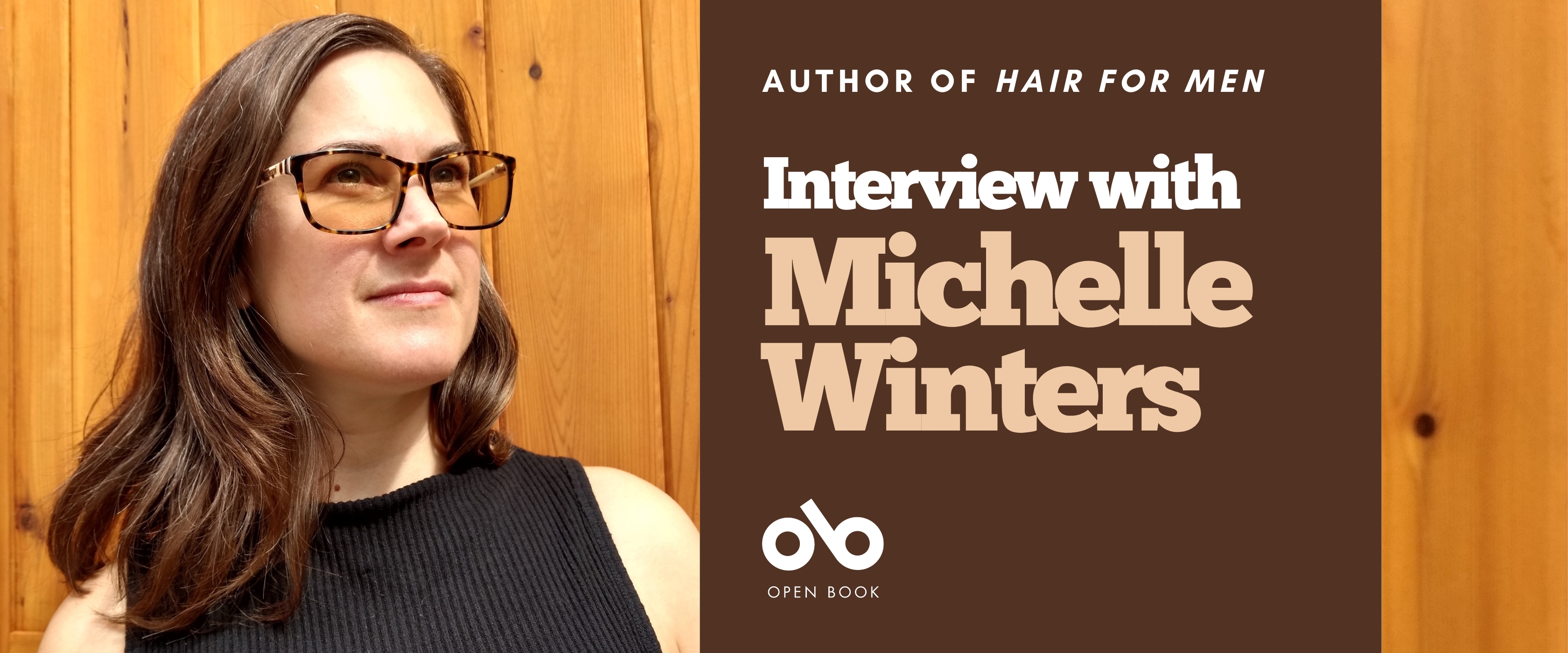 Interview with Michelle Winters, author of Hair for Men banner. Background image of author standing proudly in front of a wood panelled wall, woman with long brown hair and tinted sunglasses, wearing a sleeveless black shirt and looking askance. Burgundy section to centre right of banner with text and Open Book logo overlaid.