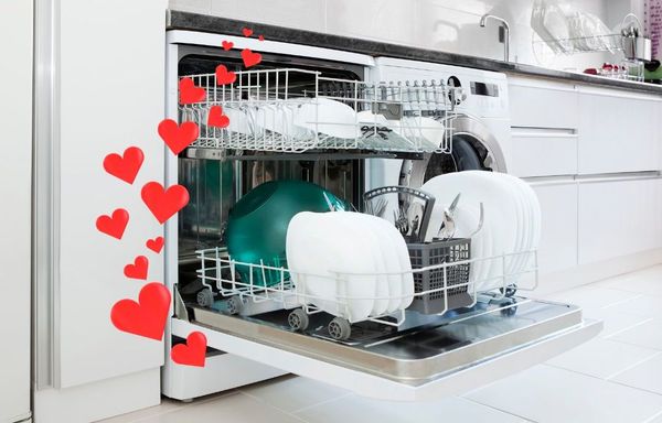 Photo of a dishwasher filled with dishes with illustrated hearts superimposed overtop