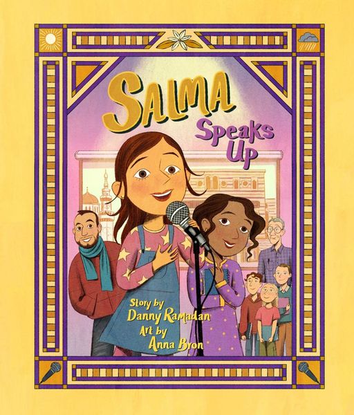 Cover of Salma Speaks Up by Danny Ramadan with art by Anna Bron. The illustration shows a smiling girl with long brown hair holding a microphone, one hand on her chest, as she speaks on stage. Beside her stands her friend, also smiling, with more children and adults watching in the background. The border of the cover is decorated with geometric purple and yellow patterns, with small illustrations of a sun, a flower, a cloud, and microphones.