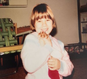 Photo of child-me and my pet hamster Tiffany