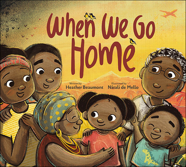 Book cover for "When We Go Home" written by Heather Beaumont and illustrated by Natali de Mello. The illustration shows a warm, multigenerational family gathering with seven Black family members embracing and smiling together against a golden yellow and orange sunset background. The family includes children, adults, and an elderly woman wearing a yellow headwrap and gold hoop earrings. Small birds fly in the distance and an orange bird silhouette appears in the upper right corner. The title appears in large, hand-lettered burgundy text at the top of the cover.