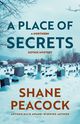 Book cover of A Place of Secrets by Shane Peacock. The image shows a snow-covered cemetery filled with old gravestones under a pale blue winter sky, framed by bare tree branches. The title text “A Place of Secrets” appears in large dark blue letters, with the subtitle “A Northern Gothic Mystery” in smaller rust-coloured font. The author’s name, “Shane Peacock,” is printed in bold rust-orange at the bottom, along with the line “Arthur Ellis Award–Winning Author.” The scene evokes a haunting, atmospheric tone fitting for a gothic mystery.
