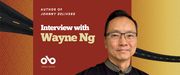 Interview with Wayne Ng, author of Johnny Delivers banner. Background image from covered of tan textured surface with stylized, narrowing roadway running from left to right horizontally and narrowing. Solid red section to centre-left with text and Open Book logo overlaid. Image of author to centre-right, man with dark, neatly combed hair and glasses with half-frames, wearing a black shirt and smiling slightly as he looks outward.