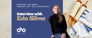 Interview with Erin Silver, author of I Am Jewish banner. Background image of light, beige colour with rollled scroll and Bar Mitzvah garments to the right of banner. To centre-left a solid blue section with text and Open Book logo overlaid. To centre-left, image of the author, a young woman with long, dark blonde hair flowing over her black turtleneck as she leans back while smiling widely, sitting on a stool with one hand in her lap and another bracing the seat behind her.