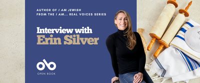 Interview with Erin Silver, author of I Am Jewish banner. Background image of light, beige colour with rollled scroll and Bar Mitzvah garments to the right of banner. To centre-left a solid blue section with text and Open Book logo overlaid. To centre-left, image of the author, a young woman with long, dark blonde hair flowing over her black turtleneck as she leans back while smiling widely, sitting on a stool with one hand in her lap and another bracing the seat behind her.