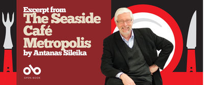 Banner image for an excerpt from The Seaside Café Metropolis by Antanas Sileika, published on Open Book. The left side features the title text in bold cream lettering on a deep red background, with stylized fork and knife illustrations framing a white plate graphic. On the right, author Antanas Sileika is smiling, seated casually in a dark blazer and sweater over a light blue shirt. The Open Book logo appears beneath the text. Banner image for an excerpt from The Seaside Café Metropolis by Antanas Sileika, published on Open Book. The left side features the title text in bold cream lettering on a deep red background, with stylized fork and knife illustrations framing a white plate graphic. On the right, author Antanas Sileika is smiling, seated casually in a dark blazer and sweater over a light blue shirt. The Open Book logo appears beneath the text.