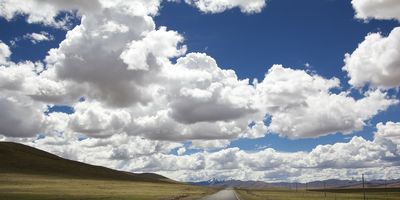 Long road with clouds