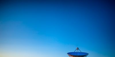 A massive radio telescope - Part of the Very Large Array - Photo by Donald Giannatti