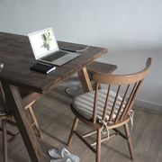 Table with laptop and notebook